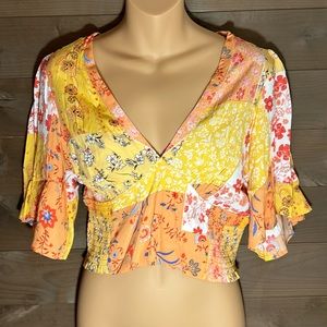 FOREVER 21 Orange and yellow Floral FLARE top. NWT